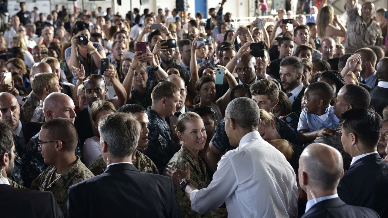 U.S. President Barack Obama greets service members after speaking at Naval Station Rota in southwestern Spain on Sunday, July 10.