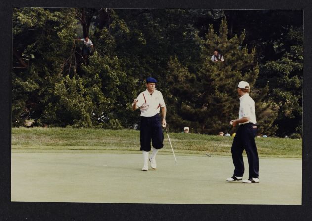 Baltusrol's next major was in 1993. Payne Stewart (left, sporting the colors of the Buffalo Bills NFL team) congratulates Lee Janzen -- who beat the 1991 champion by two shots to win the first of his two U.S. Opens, equaling Nicklaus' 1980 scoring record. Spot the photographers in the trees.