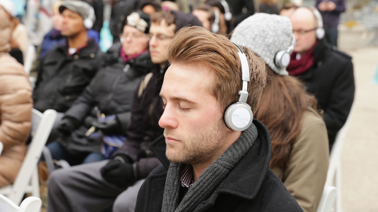 New Yorkers using the Headspace app during a "Meditation Moment" at Rockefeller Plaza in 2014. 