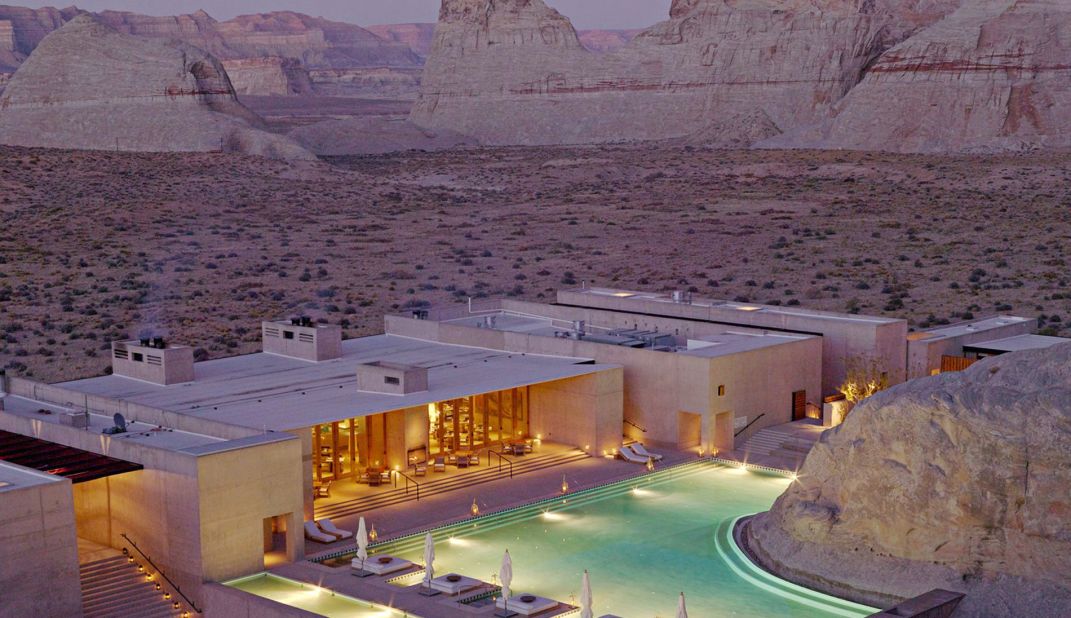 Concrete walls, rough timber furnishings and a muted brown color palette help Canyon Point, Utah's Amangiri Resort embrace its desert location in style.