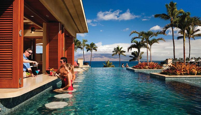 The adults-only infinity pool is a highlight at Four Seasons Resort Maui at Wailea. It features an underwater music system, a swim-up bar and unrivaled views over Wailea Beach.