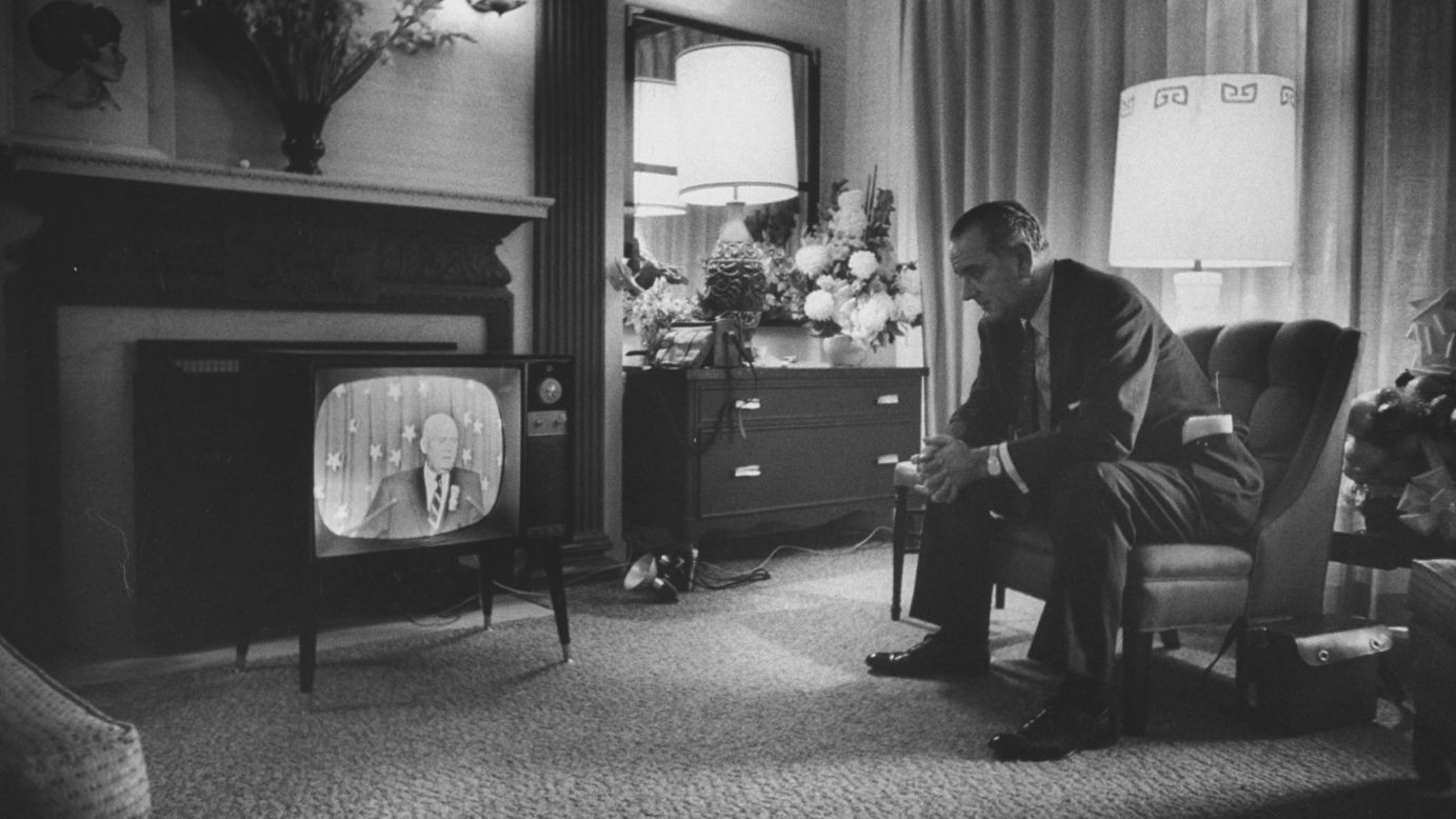 Johnson watches television during the convention. He received 409 votes on the only convention ballot, far behind Kennedy's 806. Historians believe Kennedy wanted Johnson on the ticket to help him carry Texas and some Southern states.