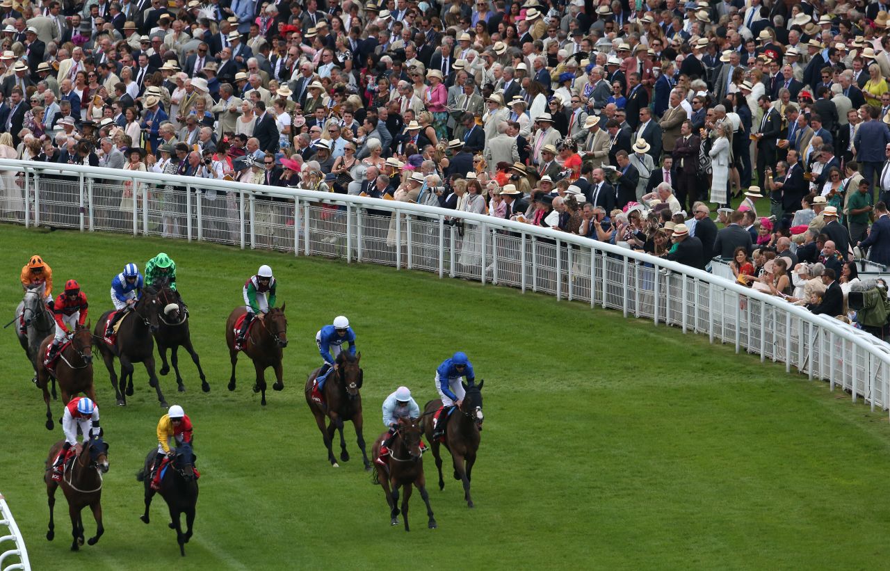 Glorious Goodwood got under way Tuesday as hordes of spectators headed to the Sussex Downs in southern England to celebrate the "last hurrah" of the summer social season. 