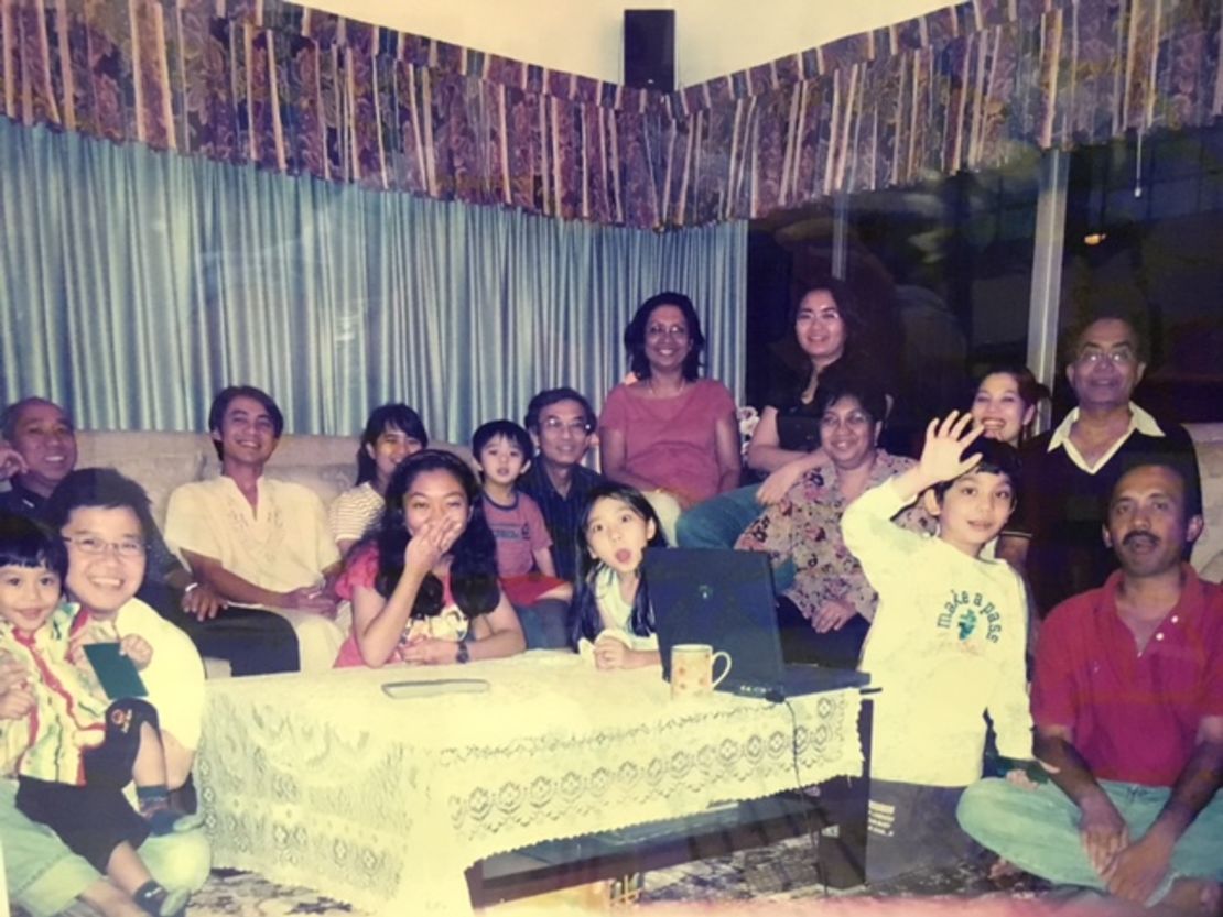 Malaysia Airlines flight 370 pilot Zaharie Ahmad Shah seen in a family photo (far right, seated) provided by his sister (middle back). 