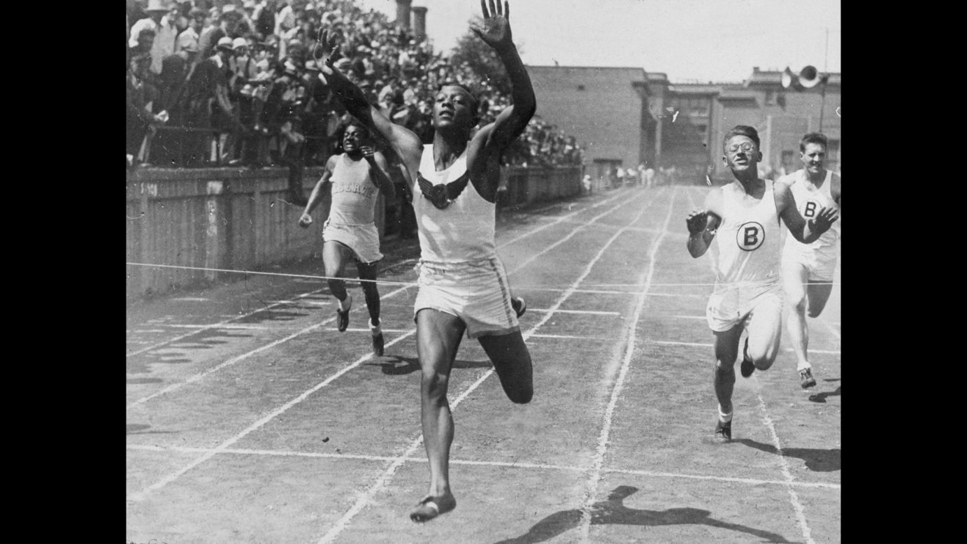 Owens wins a 100-meter race in high school in June 1932. Owens, the son of a sharecropper and grandson of slaves, was born in Alabama in 1913. His family moved to Cleveland when he was a child, and he went on to attend the Ohio State University.