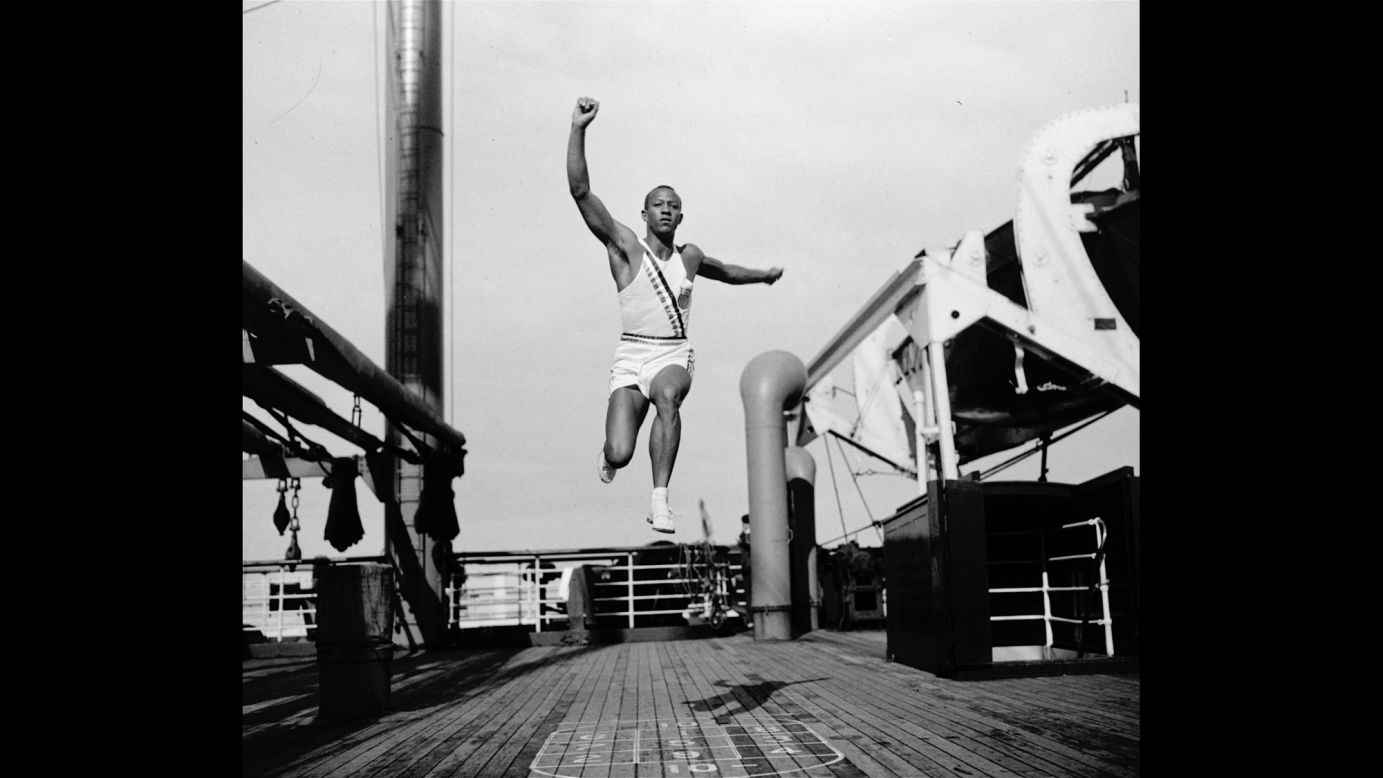 Owens practices the long jump on a boat as he travels to Berlin for the Olympics in 1936.