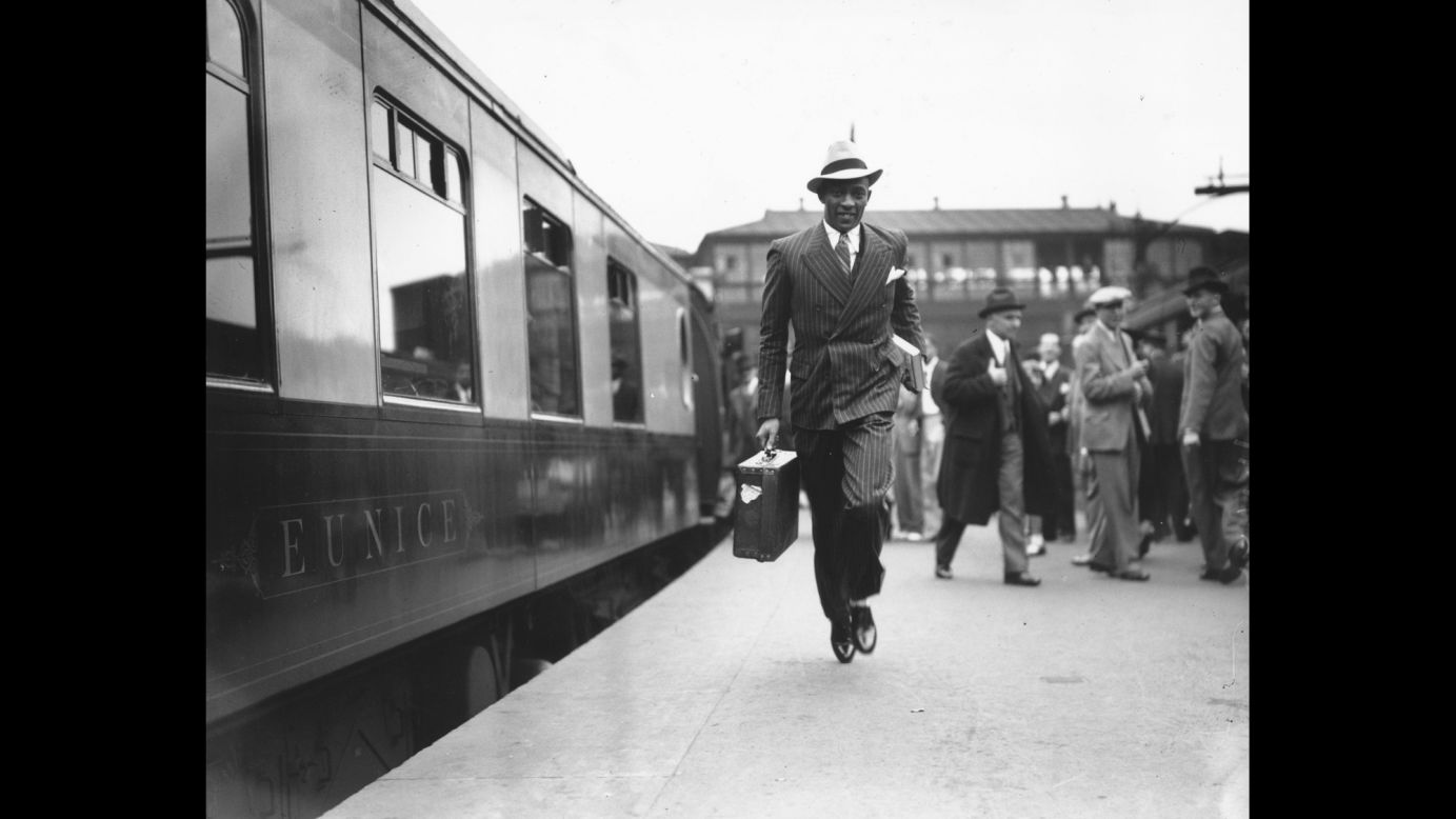 Owens dashes for a train at London's Waterloo station before heading back to the United States.