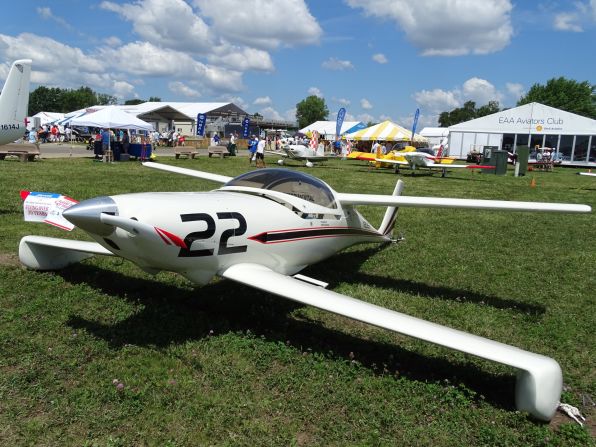 Sam Hoskins bought a kit to build the Quickie Q-200 in 1981. The plane has two sets of wings. The front wings are called canards and include the plane's landing gear. Note: there's no horizontal stabilizer on the tail. This is just one of many unusual planes at the 2016 AirVenture air show in Oshkosh, Wisconsin.