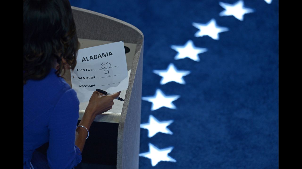 A staff member tallies Alabama's votes during roll call on Tuesday.