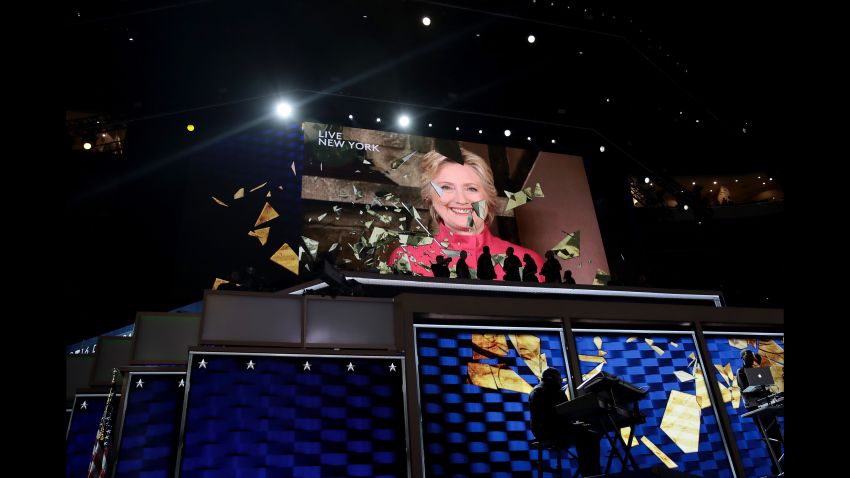 PHILADELPHIA, PA - JULY 26:  A screen displays Democratic presidential candidate Hillary Clinton delivering remarks during the evening session on the second day of the Democratic National Convention at the Wells Fargo Center, July 26, 2016 in Philadelphia, Pennsylvania. Democratic presidential candidate Hillary Clinton received the number of votes needed to secure the party's nomination. An estimated 50,000 people are expected in Philadelphia, including hundreds of protesters and members of the media. The four-day Democratic National Convention kicked off July 25.  (Photo by Drew Angerer/Getty Images)