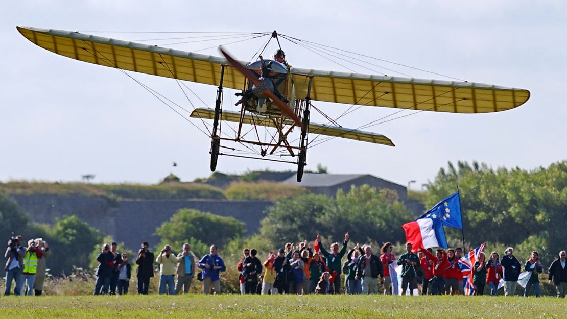 Frenchman Edmond Salis flies a restored Bleriot XI in July 2009 to mark the 100th anniversary of Louis Bleriot's historic crossing.