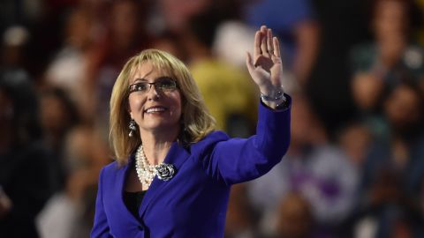 Former U.S. Rep. Gabby Giffords waves to the audience before speaking on Wednesday.
