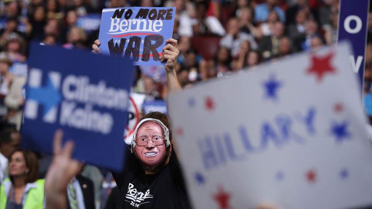 A delegate wears a Bernie Sanders mask on Wednesday. Sanders finished second to Clinton in the presidential primaries.