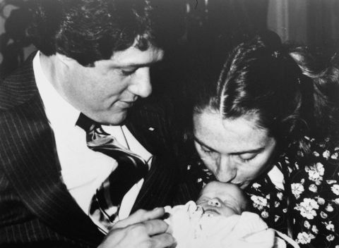 Hillary Clinton kisses week-old Chelsea in March 1980. Bill Clinton was governor of Arkansas at the time.