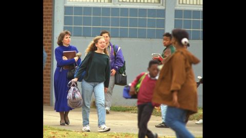 Chelsea is seen outside her school in Little Rock, Arkansas, in November 1992.