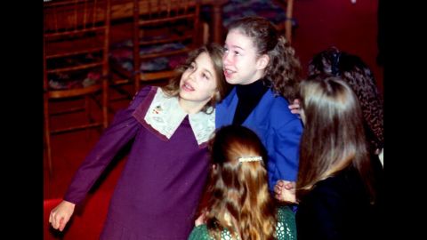 Chelsea, in the blue, attends a Washington luncheon with a friend in January 1993.