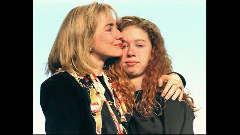 Hillary Clinton hugs her daughter during a farewell address to the people of Arkansas in January 1993. Their next stop was the White House.
