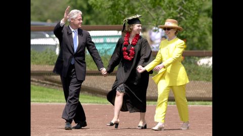 Bill Clinton waves after his daughter's college graduation in June 2001.