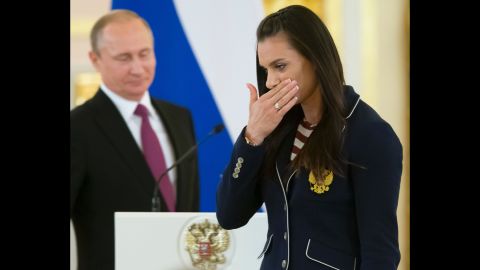 Yelena Isinbayeva is one of Russia's most famous athletes, but she won't be at the Rio Games. The polevaulter is barred from competing due to the blanket ban the IAAF placed on Russian track and field athletes. She wiped away a tear after giving a speech during a reception for the team hosted by President Putin.