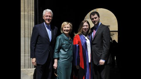 The Clintons and Marc Mezvinsky pose at Radcliffe Square in Oxford, England, where Chelsea graduated with a doctorate degree in international relations from Oxford University in May 2014.