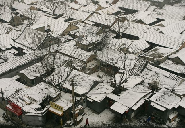 The pathways run alongside traditional houses with courtyards, forming close knit-neighborhoods. 