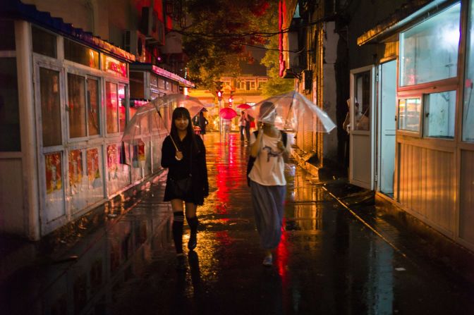 Night scene in a traditional Beijing Hutong. Many of these narrow alleyways have stood since the 13th century, the time of the Yuan Dynasty. 