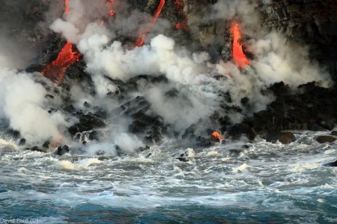 The lava flow is about 66 feet wide at the point where it tumbles off a cliff into the water.