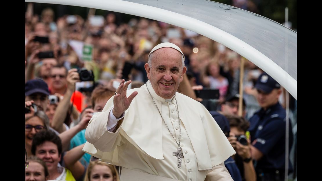 Francis greets the faithful Thursday as he arrives at a monastery in Czestochowa.