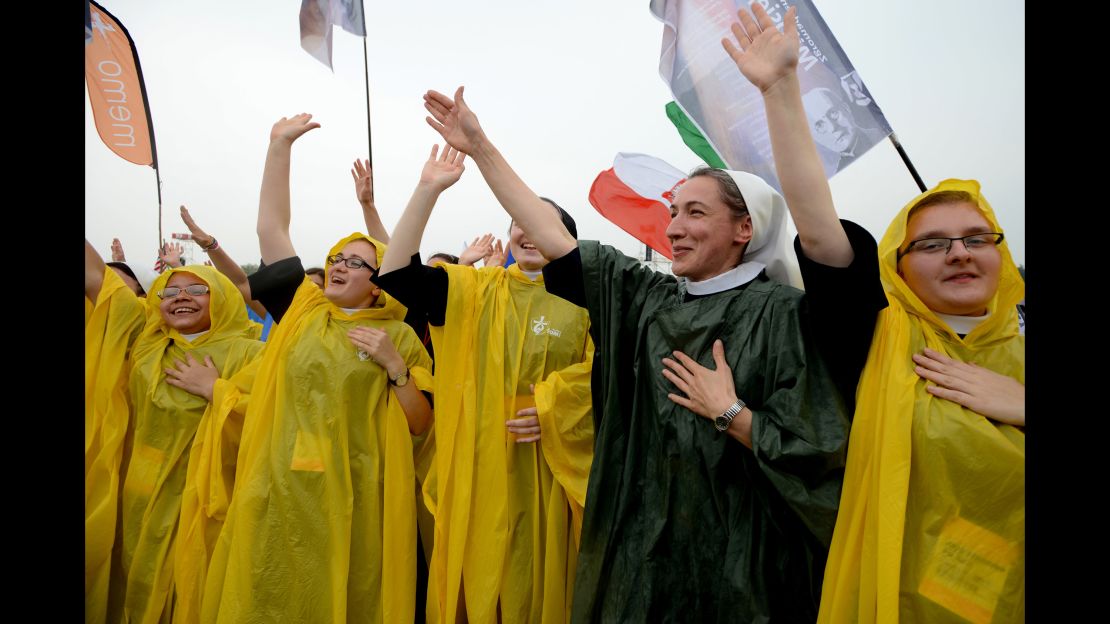 Nuns wait for the arrival of Pope Francis to Blonia Park in Krakow.