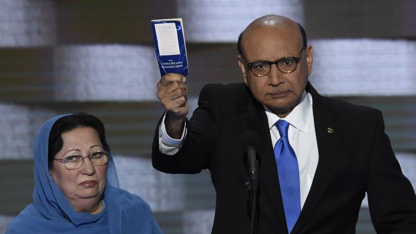 Khizr Khan holds his personal copy of the US Constitution while addressing delegates on the fourth and final day of the Democratic National Convention at Wells Fargo Center on July 28, 2016 in Philadelphia, Pennsylvania.  
Khizr Khans son, Humayun S. M. Khan was a University of Virginia graduate and enlisted in the US Army. Khan was one of 14 American Muslims who died serving the United States in the ten years after the September 11, 2001 terrorist attacks. / AFP / SAUL LOEB        (Photo credit should read SAUL LOEB/AFP/Getty Images)