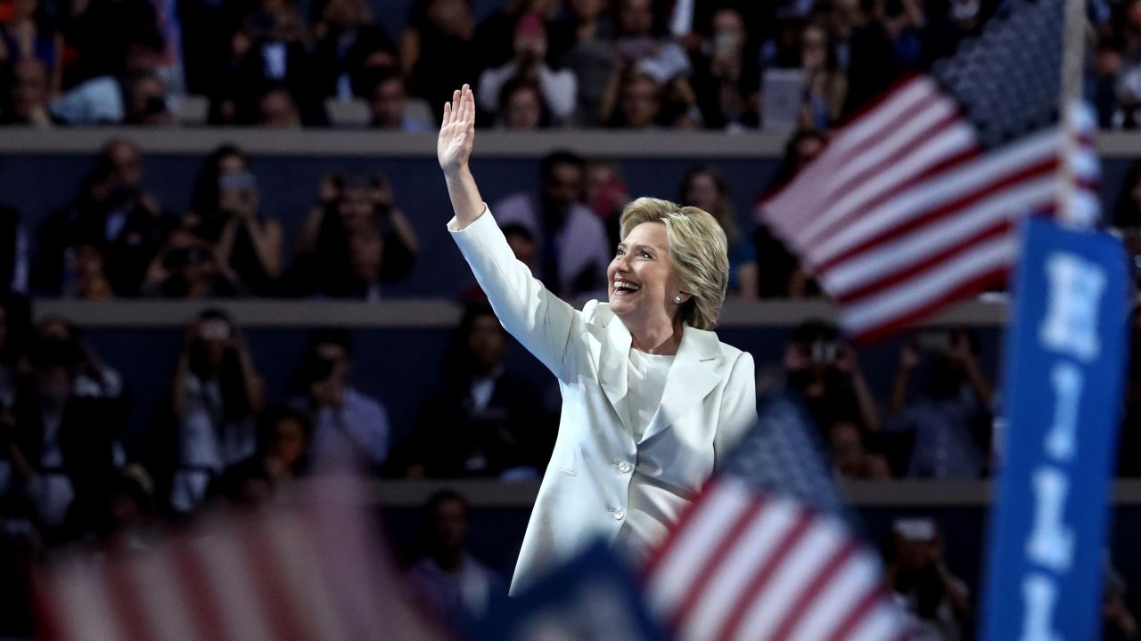 Democratic presidential candidate Hillary Clinton acknowledges the crowd as she arrives on stage during the fourth day of the Democratic National Convention, July 28, 2016 in Philadelphia. 