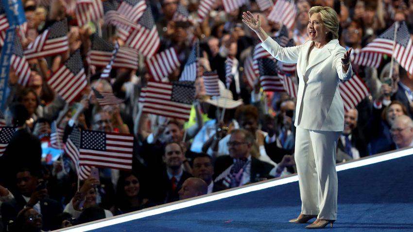 Hillary Clinton acknowledges the crowd as she arrives on stage during the fourth day of the Democratic National Convention at the Wells Fargo Center, July 28, 2016 in Philadelphia, Pennsylvania.