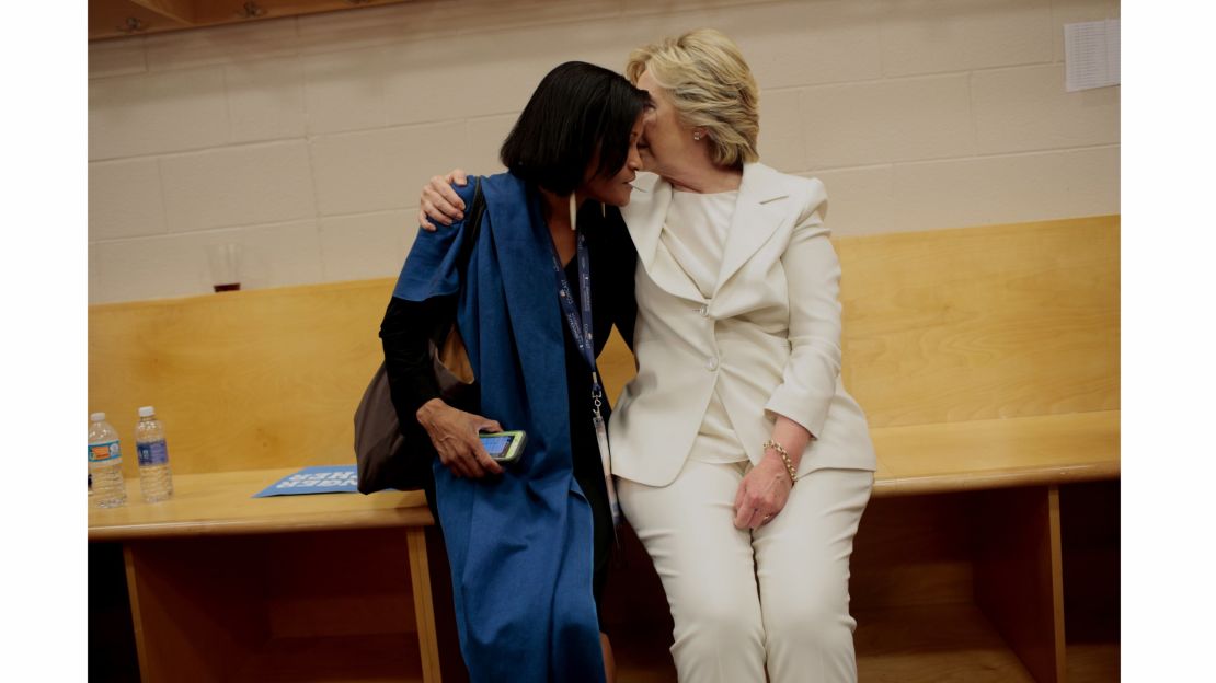 Clinton talks to Cheryl Mills, who has worked with Clinton since her White House days and was her chief of staff at the State Department. Mills now serves as an adviser to the campaign.