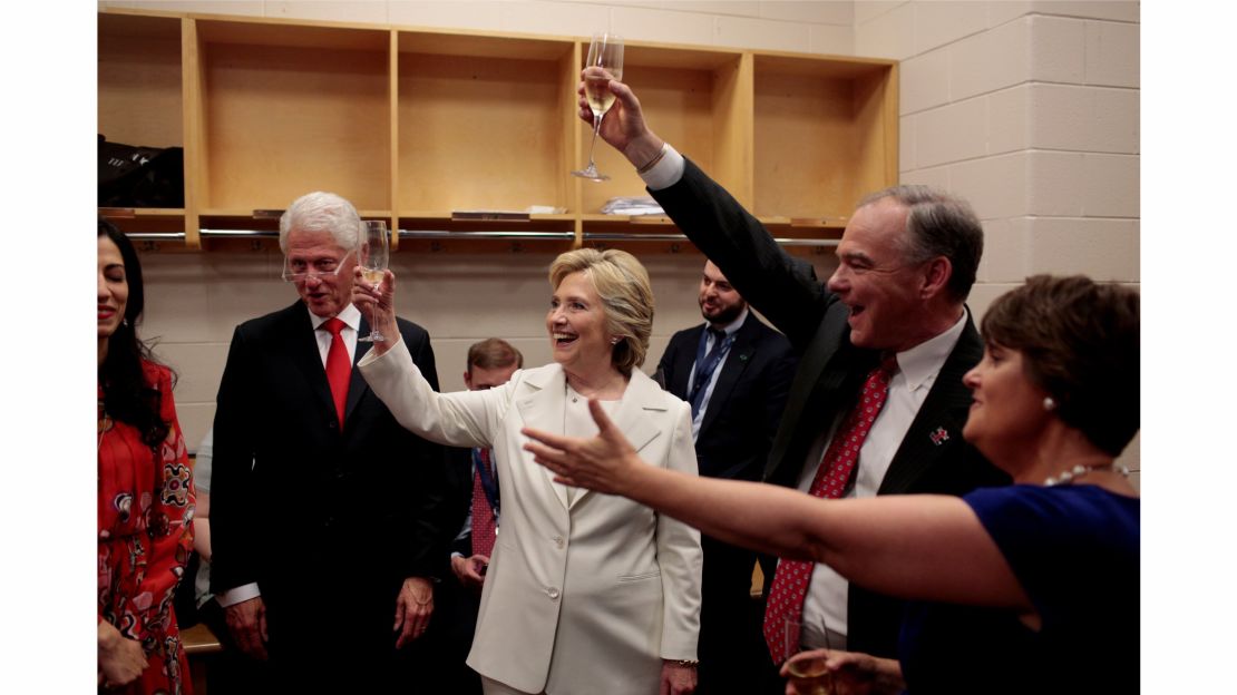 Clinton celebrates with her husband, former President Bill Clinton; her running mate, U.S. Sen. Tim Kaine; and Kaine's wife, Anne Holton.