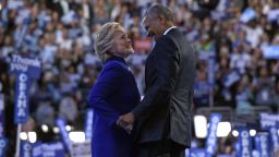 President Barack Obama, right, talks with Democratic presidential candidate Hillary Clinton, left, following Obama's speech at the Democratic National Convention in Philadelphia, Wednesday, July 27, 2016.
