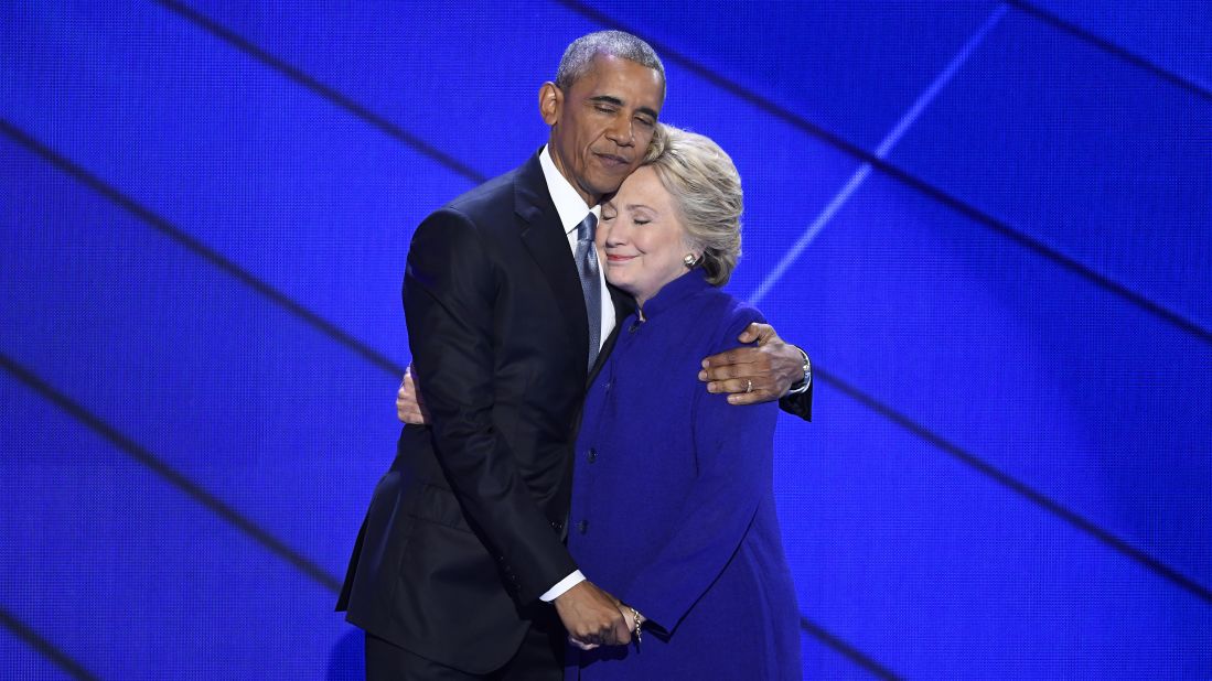 U.S. President Barack Obama hugs Hillary Clinton after speaking at the Democratic National Convention on Wednesday, July 27. Obama told the crowd at Philadelphia's Wells Fargo Center that Clinton is ready to be commander in chief. "For four years, I had a front-row seat to her intelligence, her judgment and her discipline," he said, referring to Clinton's stint as secretary of state.