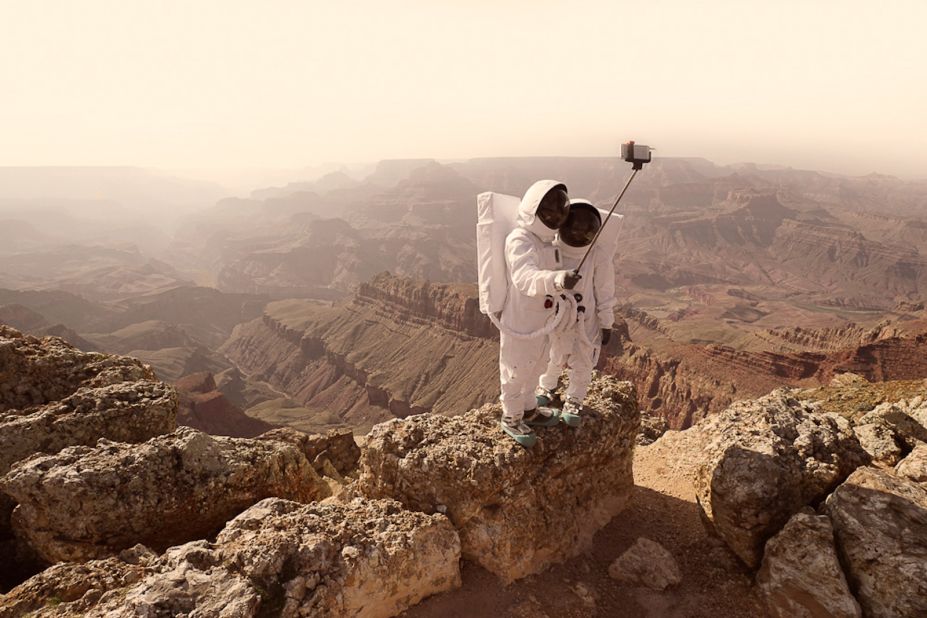 In his "Greetings from Mars" series, photographer Julien Mauve imagines life as a tourist on the Red Planet -- selfie-stick and all.