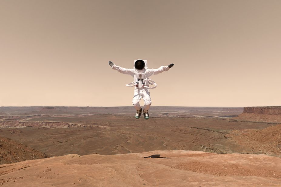 The artist combines the unknown Mars landscape with familiar vacation photography. <br />