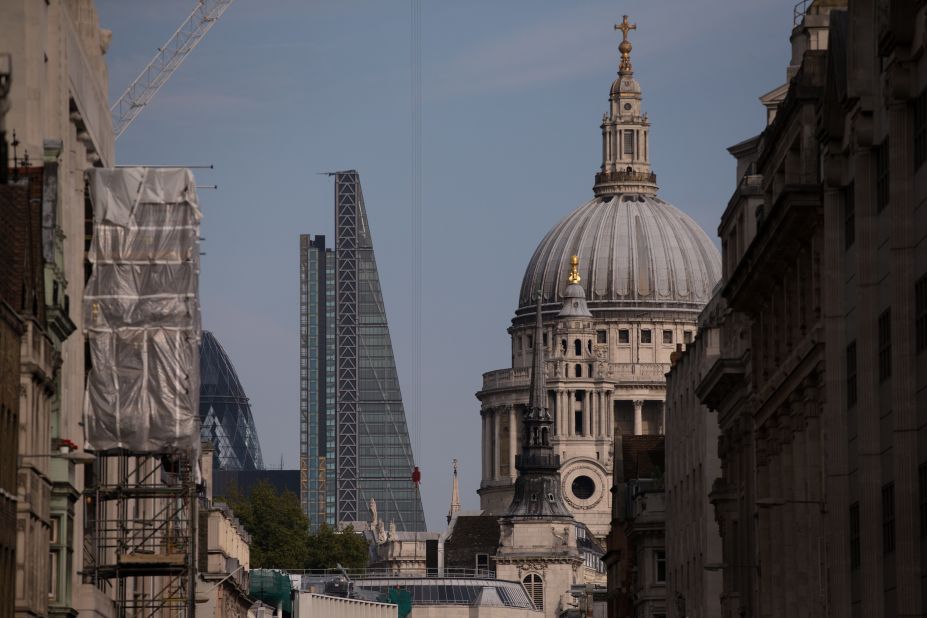 Today, London's skyline juxtaposes the old and the new. Here the Leadenhall Building -- known as the "Cheesegrater" -- leans sideways to avoid blocking St Paul's Cathedral.