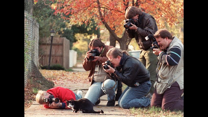Socks is surrounded by photographers in 1992 -- will Gladstone also be able to handle the spotlight? 