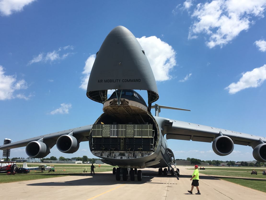 The biggest plane in the U.S. military fleet, a Lockheed C-5M Super Galaxy, raises its visor shortly after landing at Oshkosh on Tuesday. 