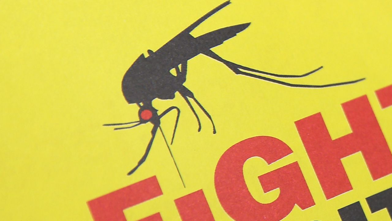 MCALLEN, TX - APRIL 14:  A city environmental health worker displays literature to be distrubuted to the public on April 14, 2016 in McAllen, Texas. Health departments, especially in areas along the Texas-Mexico border, are preparing for the expected arrival of the Zika Virus, carried by the aegypti mosquito, which is endemic to the region. The U.S. Centers for Disease Control (CDC), announced this week that Zika is the definitive cause of birth defects seen in Brazil and other countries affected by the outbreak.  (Photo by John Moore/Getty Images)