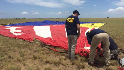 NTSB investigators examine the downed balloon.