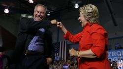 YOUNGSTOWN, OH - JULY 30:  Democratic presidential nominee former Secretary of State Hillary Clinton and democratic vice presidential nominee U.S. Sen Tim Kaine (D-VA) fist bump during a campaign rally at East High School on July 30, 2016 in Youngstown, Pennsylvania. Hillary Clinton and Tim Kaine are continuing their three-day bus tour through Pennsylvania and Ohio.  (Photo by Justin Sullivan/Getty Images)