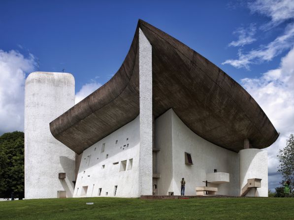 The chapel was built on a pre-existing pilgrimage site. The curved roof demonstrates Le Corbusier's mastery of concrete. 