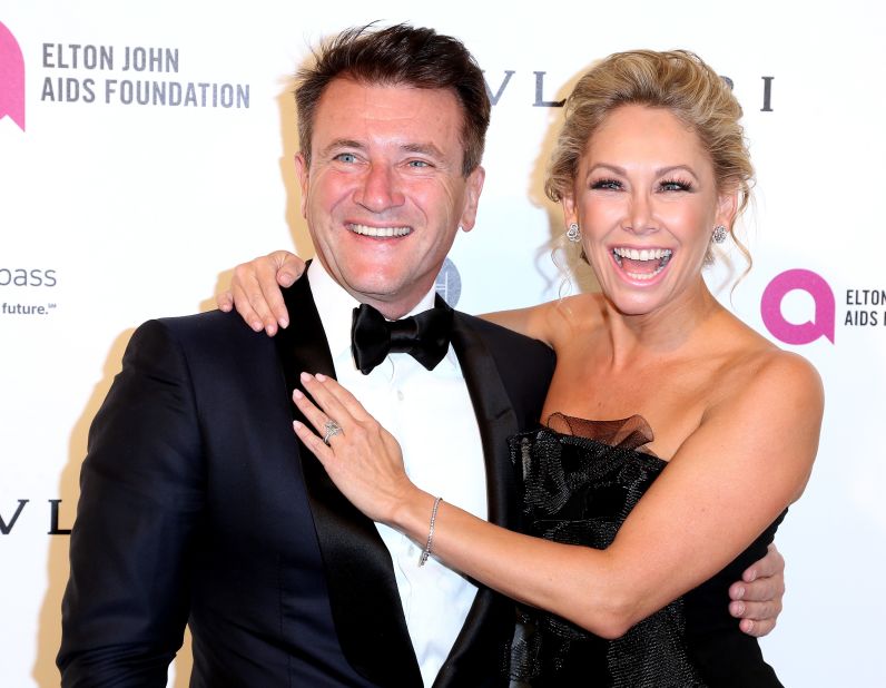 "Shark Tank" star Robert Herjavec married his former "Dancing With The Stars" partner, Kym Johnson, 39, on July 31 in Los Angeles.