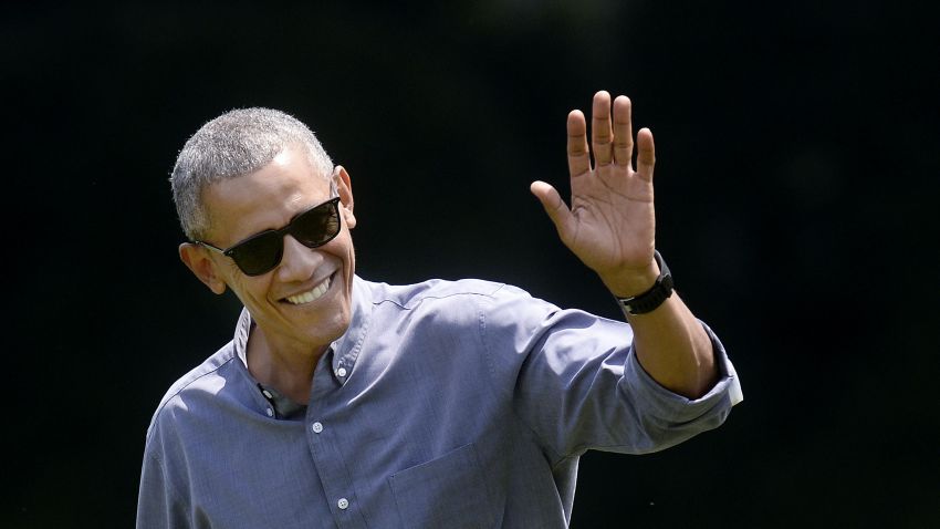 U.S. President Barack Obama walks back to the White House after returning from Camp David on July 31, 2016 in Washington, D.C.