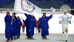 Taiwan's flag bearer, speed skater Sung Ching-Yang leads his national delegation during the Opening Ceremony of the Sochi Winter Olympics at the Fisht Olympic Stadium on February 7, 2014 in Sochi.  AFP PHOTO / ANDREJ ISAKOVIC        (Photo credit should read ANDREJ ISAKOVIC/AFP/Getty Images)