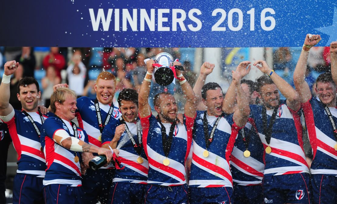 Great Britain Royals captain Luke Treharne lifts the trophy after beating France in the final of the Rugby Europe Sevens event in Exeter.