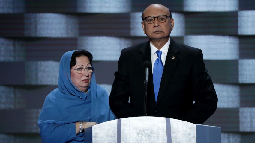 Khizr Khan, father of deceased U.S. Army Capt. Humayun S. M. Khan, delivers remarks as he is joined by his wife Ghazala Khan on the fourth day of the Democratic National Convention at the Wells Fargo Center, July 28, 2016 in Philadelphia, Pennsylvania.